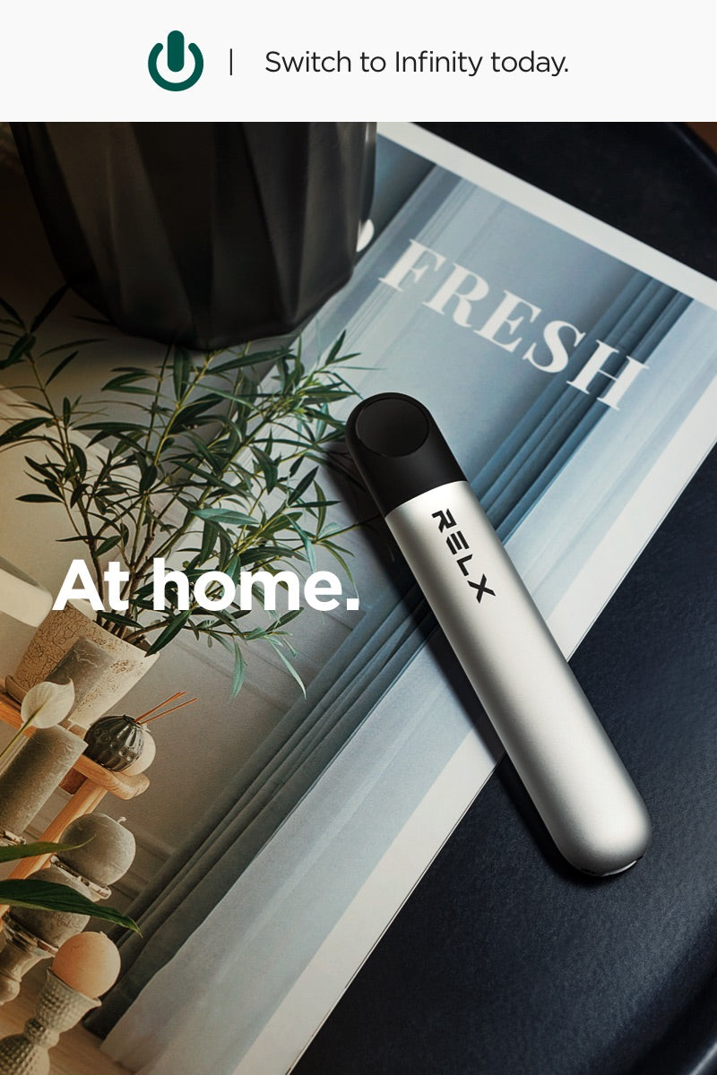 RELX Infinity Device lying on Design Table - RELX at Home